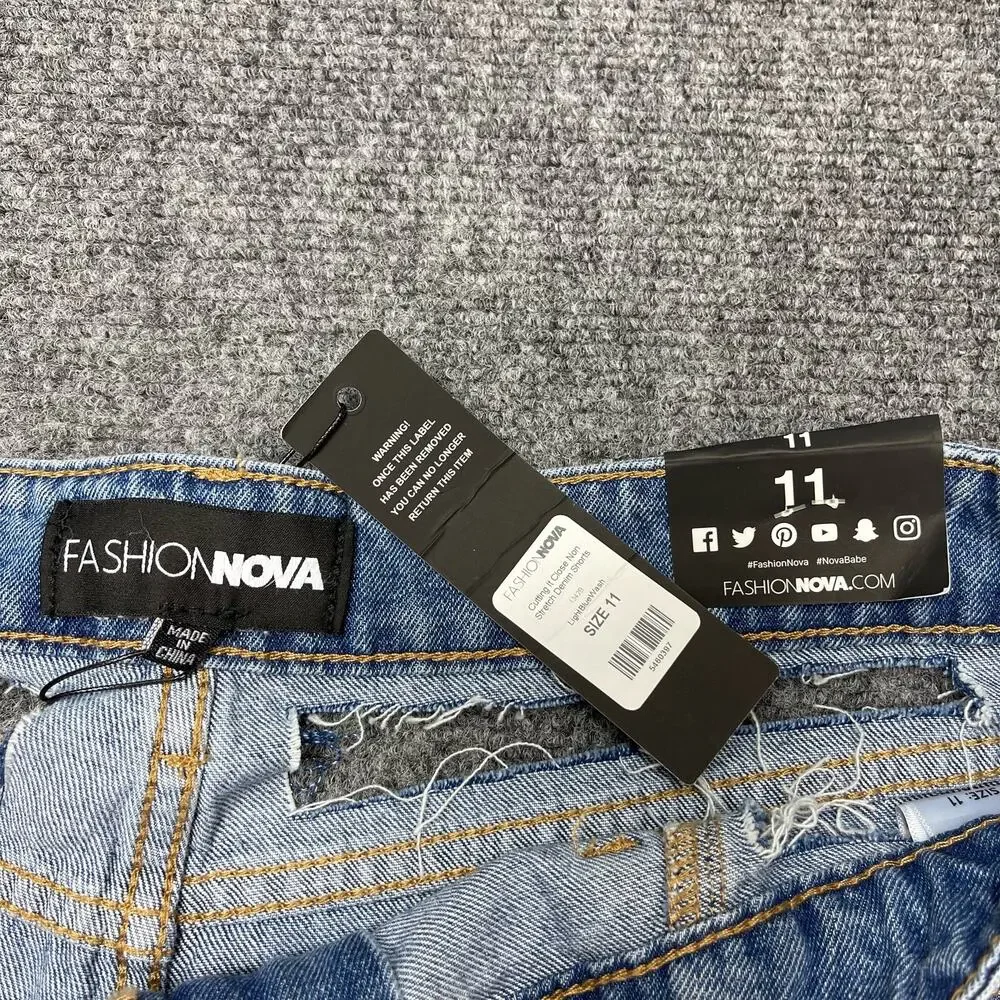FashionNova Light Blue Wash Distressed Shorts Size 11